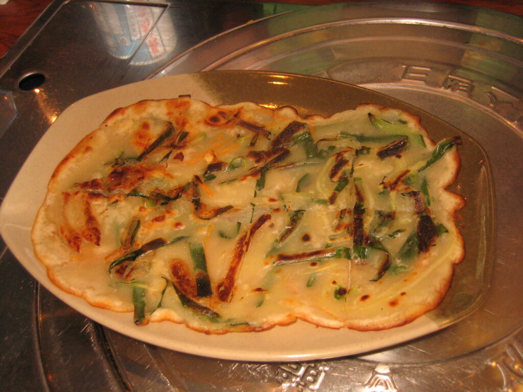 Pajeon, the scallion pancake. (Wikimedia Commons)