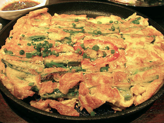 Best eaten hot off the pan, cut into wedges and dipped in soy-vinegar sauce.