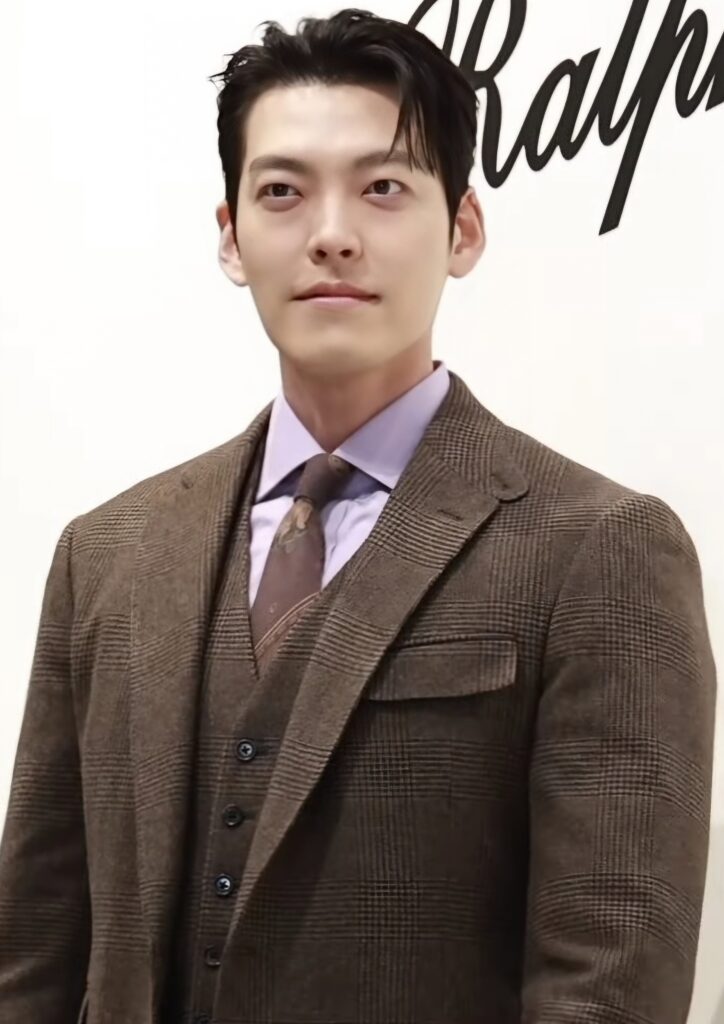 Kim Woo-bin, who stars as the legendary courier 5-8 in Black Knight, at a March 2024 Ralph Lauren photo call (press photo, not a still from the series). (Photo: 티비텐 TV10 / Ten Asia, CC BY 3.0 via Wikimedia Commons)