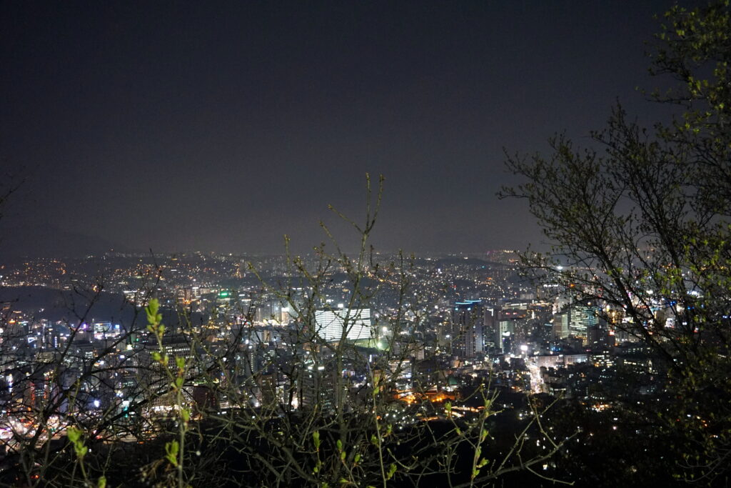 Seoul's nighttime skyline from Namsan — the glossy metropolitan backdrop of the Seoul-set My Demon. Photo: Matt Kieffer / Wikimedia Commons (CC BY-SA 2.0).