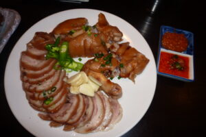 Jokbal — soy-braised pig's trotters sliced and plated for sharing. (Photo: Nesnad, CC BY-SA 3.0 via Wikimedia Commons)
