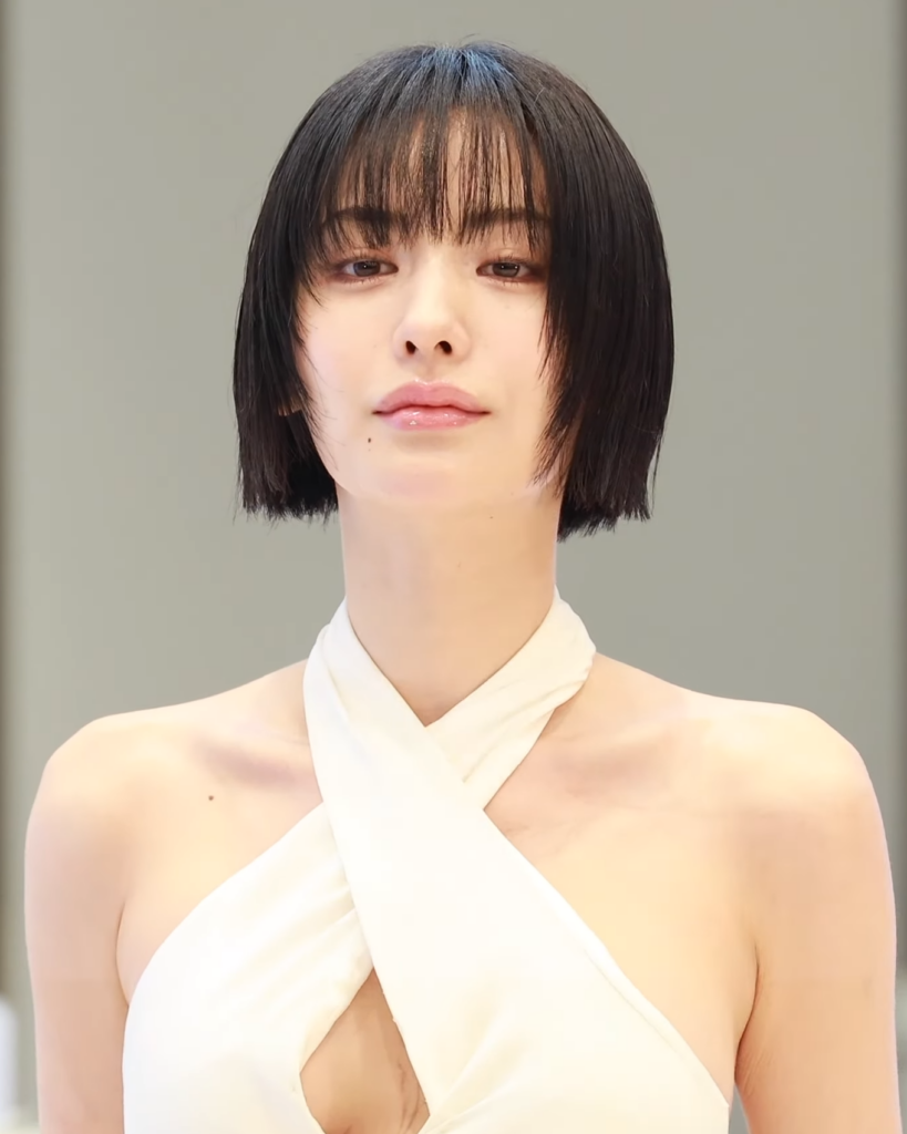 Nana (Im Jin-ah), who plays one chapter of lead Kim Mo-mi in Mask Girl, at a 2025 photo call — a press photo, not a still from the series (Photo: 티비텐 TV10, CC BY 3.0 via Wikimedia Commons)