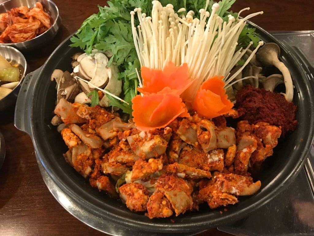 Gopchang-jeongol, a related Korean beef-intestine hot pot, showing the offal and red spicy broth in the same family as spicy naejangtang. (Photo: lazy fri13th, CC BY 2.0 via Wikimedia Commons)