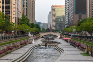 The Cheonggyecheon stream in downtown Seoul at sunrise, a reported filming location for Our Unwritten Seoul (Photo: Basile Morin, CC BY-SA 4.0, via Wikimedia Commons)