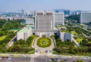 Aerial exterior view of the Supreme Court of Korea building, a large stone courthouse complex in Seocho-gu, Seoul