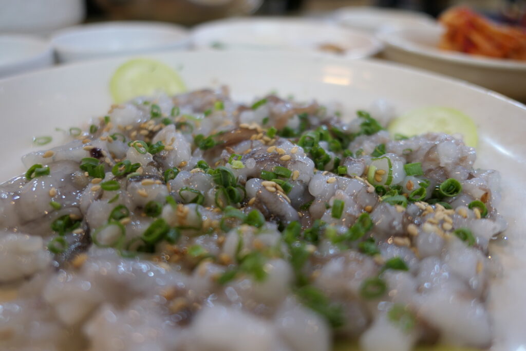 A plate of freshly cut san-nakji (산낙지), the most common way the live octopus dish is served.