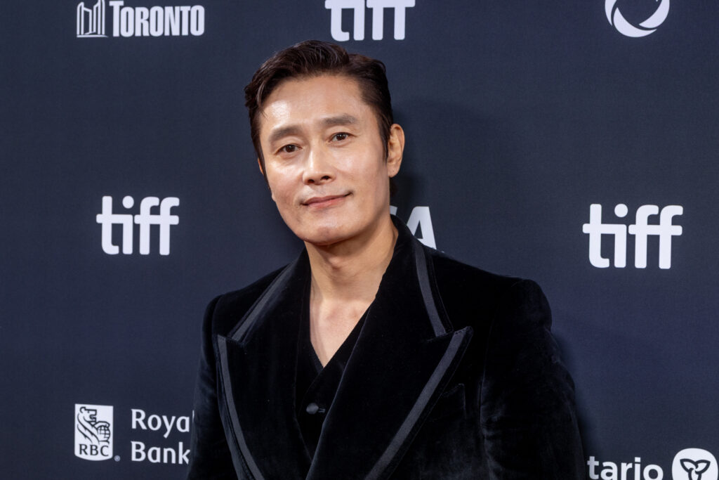 Lee Byung-hun (이병헌), who plays the Front Man / Hwang In-ho, at the 2025 Toronto International Film Festival. Public-event photo, not a still from the show. Via Wikimedia Commons, CC BY 4.0.