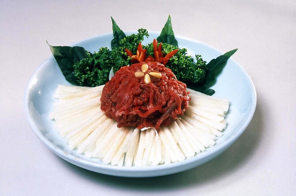 Korean seasoned raw beef, yukhoe (육회). (Photo: Korea.net / Korean Culture and Information Service, CC BY-SA 2.0 via Wikimedia Commons)